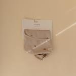 mushie Long Sleeve Baby Bib | Water Resistant Adjustable Fit for Ages 6-24 Months (Dinos)