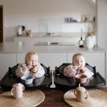 mushie Long Sleeve Baby Bib | Water Resistant Adjustable Fit for Ages 6-24 Months (Dinos)