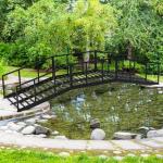 OLBRUS Metal Garden Bridge 8 FT with 4 Ground Stakes, 770 lbs Capacity Black Powder Coated Footbridge for Backyard, Lawn, Creek, Stream & Garden Decor