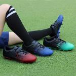 Kids Firm Ground Soccer Cleats in Blue Black