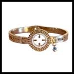 Gold Tone Evil Eye Charm Bangle with Greek Key