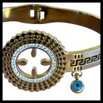 Gold Tone Evil Eye Charm Bangle with Greek Key