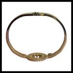 Gold Tone Evil Eye Charm Bangle with Greek Key