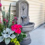 Sunnydaze Lovely Lily Polyresin Outdoor Wall Water Fountain with Lights