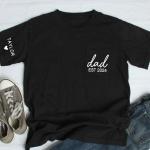 Personalized Dad Est Year Pocket T-Shirt, Dad Pocket Shirt with Kid Name, Custom Children Names on Sleeve Shirt, Gift for Grandpa, Daddy, Papa, Birthday, Father's Day 1