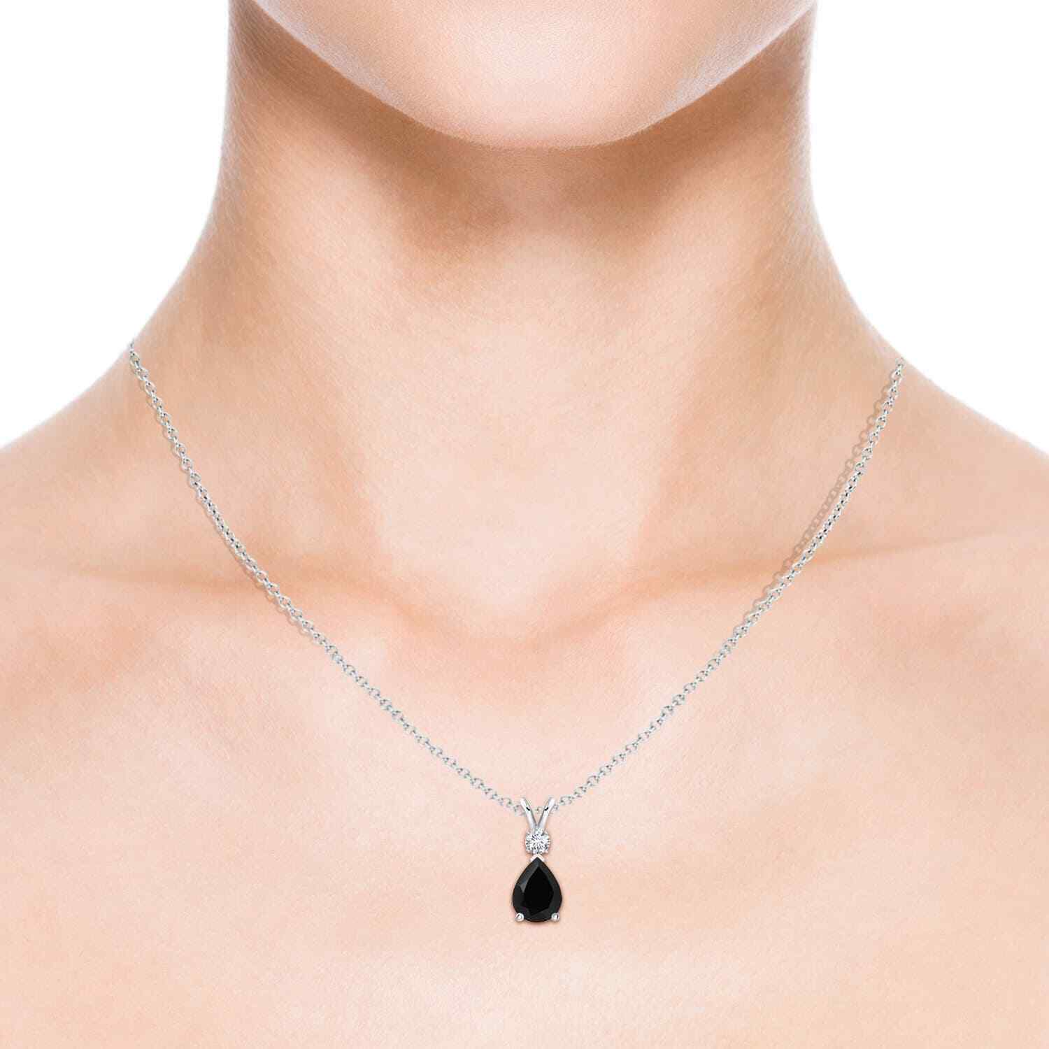 Black Onyx Teardrop Silver Pendant with Diamond