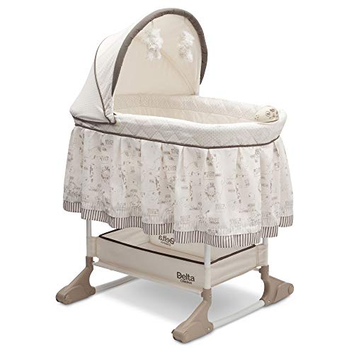 Delta Children Rocking Bedside Bassinet - Portable Crib with Lights Sounds and Vibrations, Play Time Jungle from Delta Children's Products