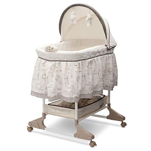 Delta Children Rocking Bedside Bassinet - Portable Crib with Lights Sounds and Vibrations, Play Time Jungle from Delta Children's Products
