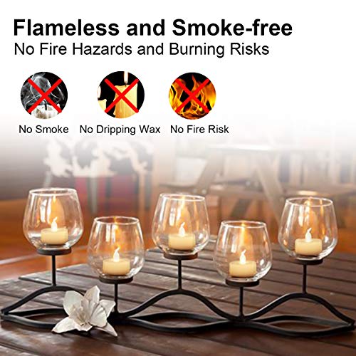 12 Pack Realistic and Bright Flickering Battery Operated Flameless LED Tea Lights Candles, tealights Electric Fake Candles for Halloween Christmas Weddings Festivals Decoration in Warm Yellow