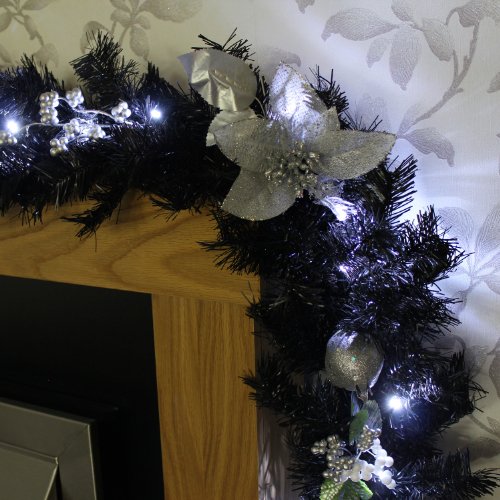 WeRChristmas Pre-Lit Decorated Garland, 40 Ice White LED Lights, Black & Silver, 9 ft / 2.7 m, Fabric, Black/Silver