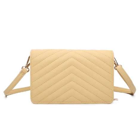 Small white designer handbag with three compartments and flap
