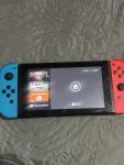 Nintendo Switch Console with Blue and Red Joy-Cons
