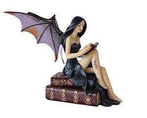 Gothic Fairy Figurine on Vintage Books