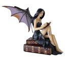 Gothic Fairy Figurine on Vintage Books