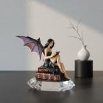 Gothic Fairy Figurine on Vintage Books