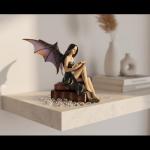 Gothic Fairy Figurine on Vintage Books