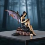 Gothic Fairy Figurine on Vintage Books