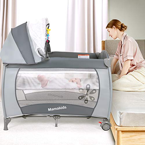 Portable Grey Travel Cot with Mattress, Toys, and Mosquito Net