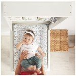 Badabulle Wall Mounted Changing Table with Mat and Storage