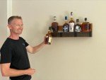 Rustic Wall-Mounted Wine and Whiskey Barrel Shelf