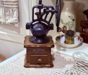 Vintage Wrought Iron Coffee Grinder with Wooden Base