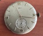 VINTAGE MEN'S DOXA S.A. WRIST WATCH MOVEMENT CAL. 942 TICKS  BUT NEEDS SERVICE
