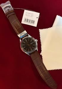 Seiko Men's Dark Green Sunray Dial Solar Powered Watch SNE529