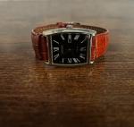 Solar powered water resistant Seiko watch, with brown, silver, and black colors