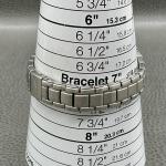 Seiko Solar Watch Womens Pink Dial Date 100M Stainless Steel Bracelet V137-0AX0