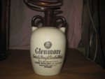 Antique Copper Moonshine Still with Glenmore Whiskey Jug
