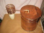 Antique Copper Moonshine Still with Glenmore Whiskey Jug