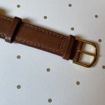 Vintage Gold Tone Camel Watch with Brown Leather Band