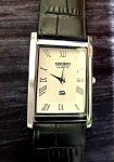 Vintage Men's Dress Watch with White Dial & Leather Band