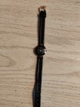 RADO Swiss Vintage Black and Gold Timepiece