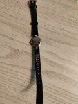 RADO Swiss Vintage Black and Gold Timepiece