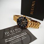 Bulova Marine Star Black Dial Gold Band Watch