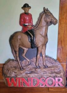 1960s Windsor Whiskey Mountie Advertising Sign