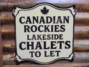 Vintage Rocky Mountains Porcelain Cabin Sign