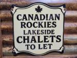 Vintage Rocky Mountains Porcelain Cabin Sign