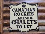 Vintage Rocky Mountains Porcelain Cabin Sign