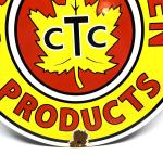 Vintage Canadian Tire Porcelain Sign with Maple Leaf