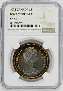 1973 RCMP Centennial Silver Dollar - Rainbow Toned