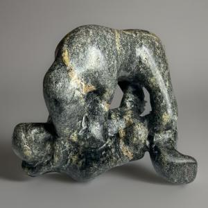 Inuit Soapstone Carving: Bear Overtaking Man