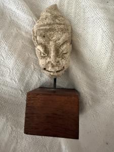Hand-Carved Tribal Head Sculpture on Wood Base