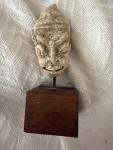 Hand-Carved Tribal Head Sculpture on Wood Base