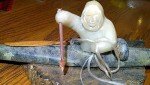 Alaskan Inuit Soapstone Kayak and Hunter Art