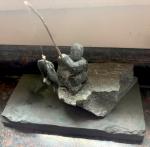 Stone Fisherman Sculpture Overlooking Ocean