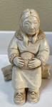 Inuit Style Resin Woman with Basket Carving