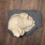 1970s Pearlite Inuit Couple with Husky Sculpture