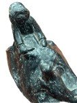 Inuit Soapstone Carving: Man Feeding Seal Fish